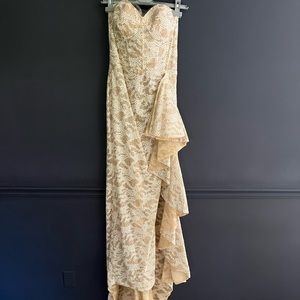 Stunning Body conscious semi sheer wedding gown.